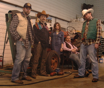 Clown Faced Cowboys by the tractor